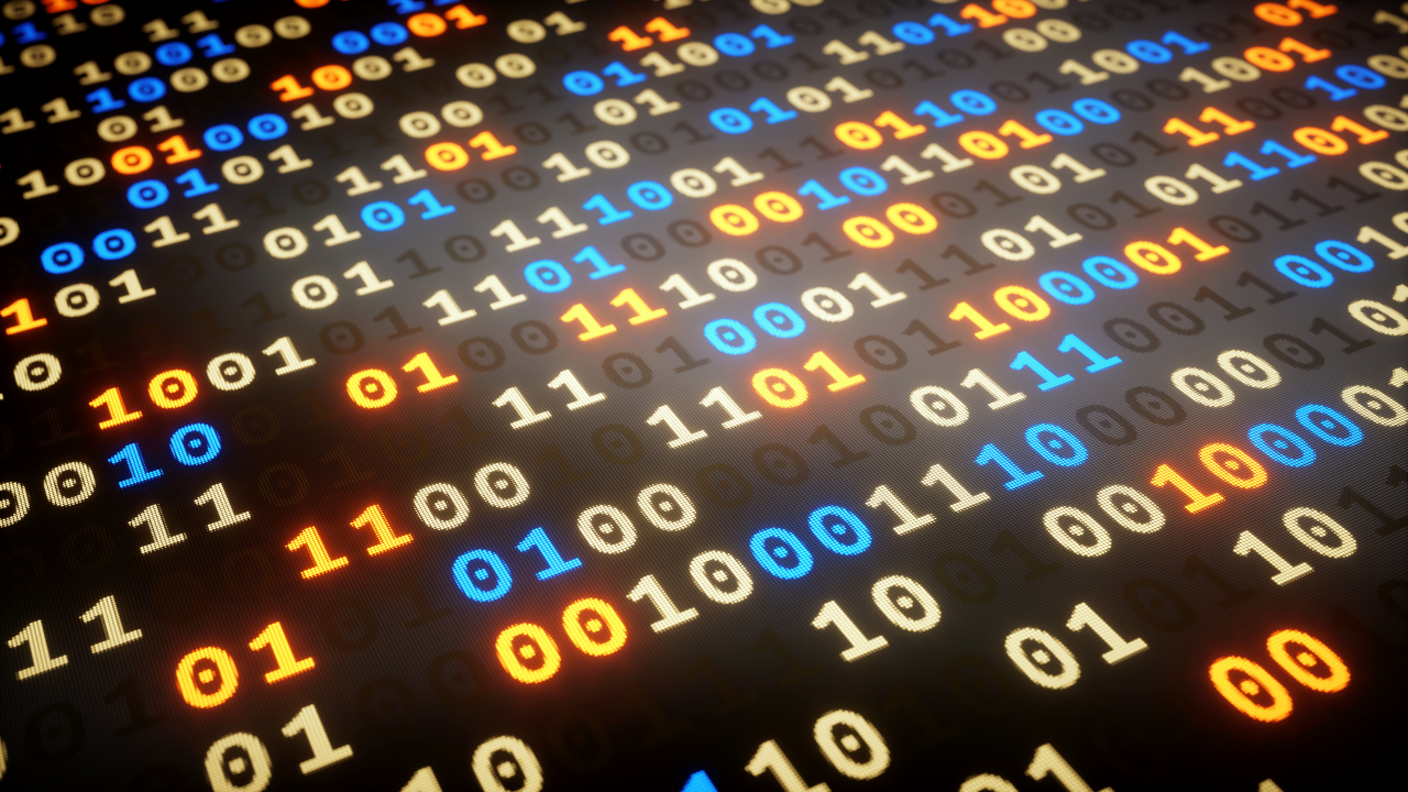 Binary code on a screen illustrating data serialization and the importance of understanding Python Pickle Module security risks and safer alternatives for secure coding practices.